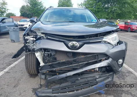 2016 Toyota Rav4 Limited z USA, uszkodzony, nr VIN 2T3DFREV5GW494712